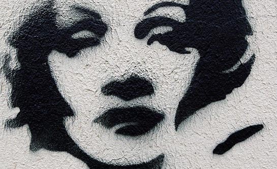 Graffiti of Marlene Dietrich sprayed on a building in Berlin